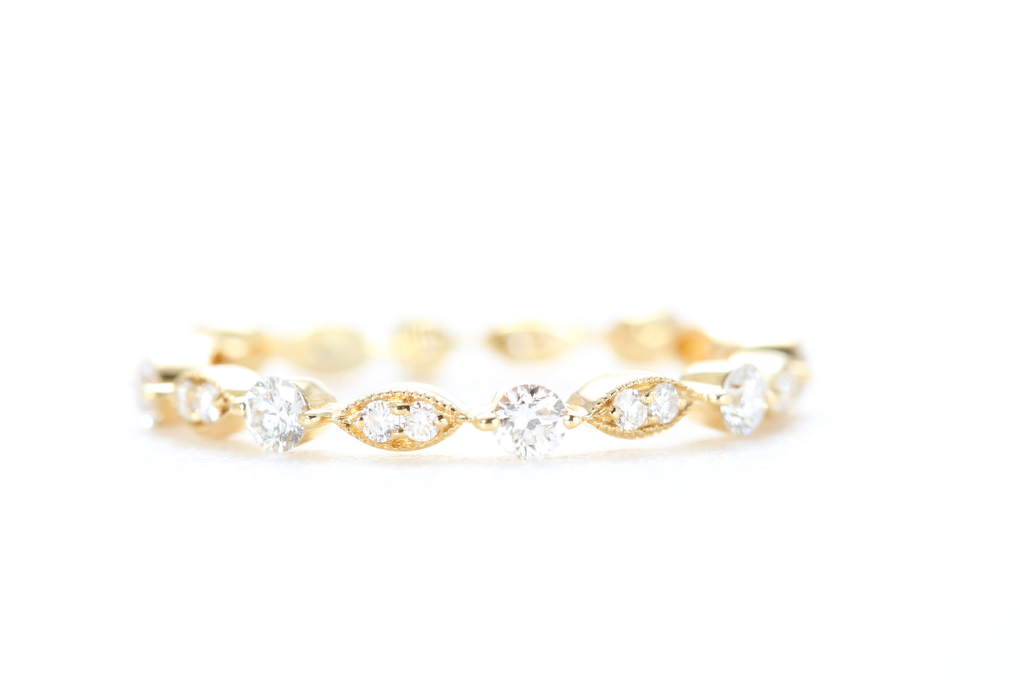 Round and Marquise Shaped Diamond Ring Yellow Gold