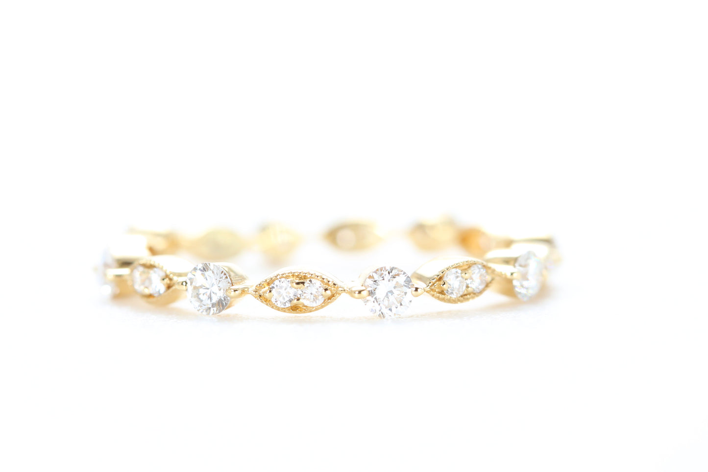 Round and Marquise Shaped Diamond Ring Yellow Gold
