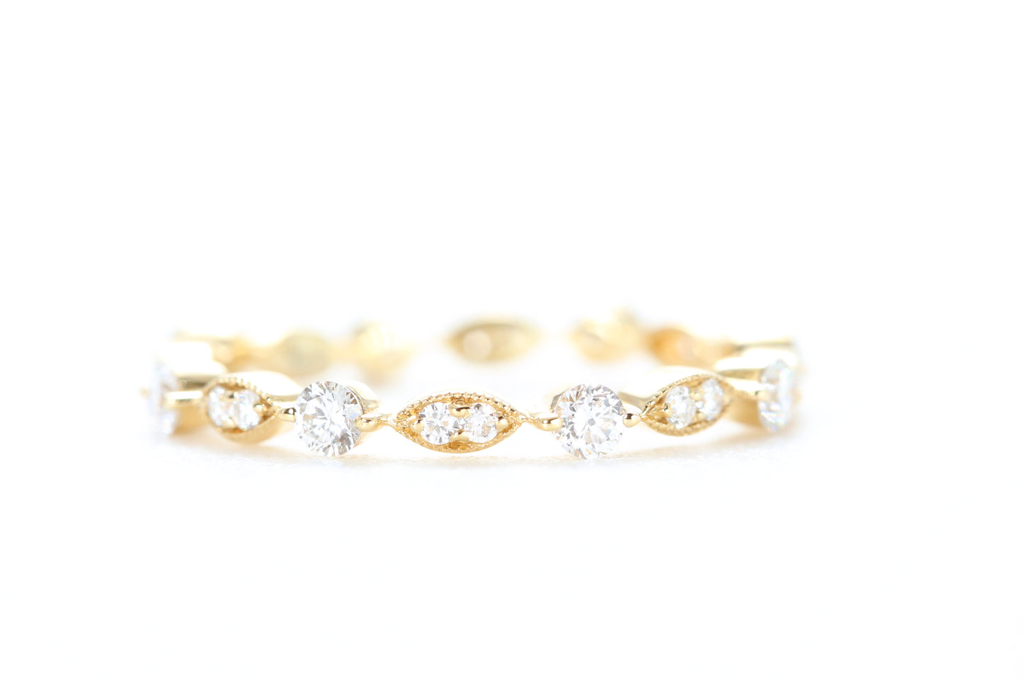 Round and Marquise Shaped Diamond Ring Yellow Gold
