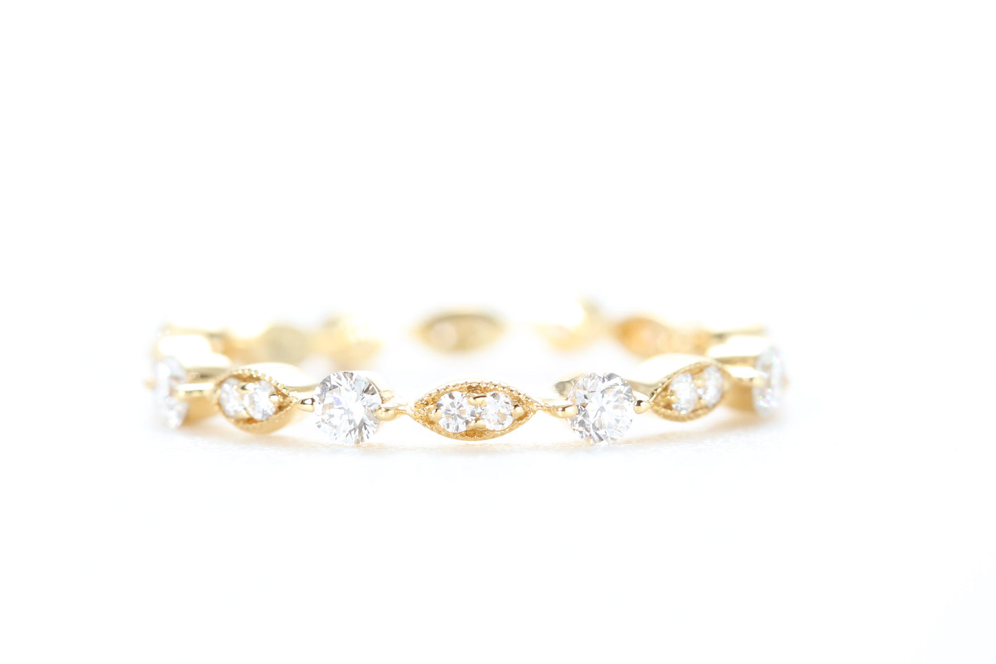 Round and Marquise Shaped Diamond Ring Yellow Gold