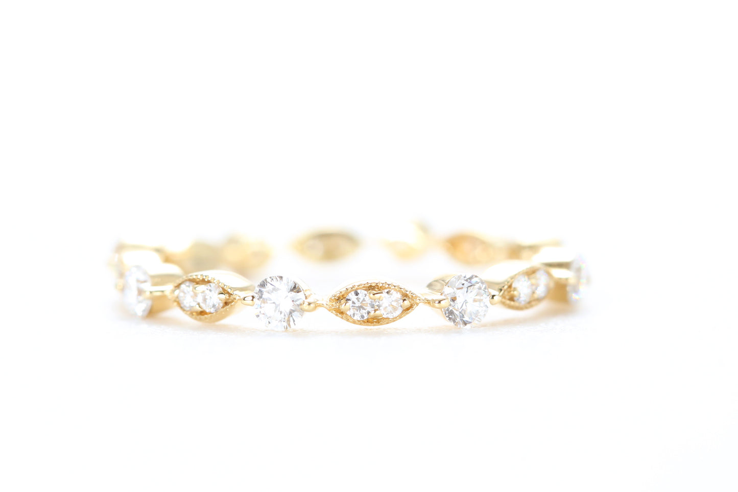 Round and Marquise Shaped Diamond Ring Yellow Gold