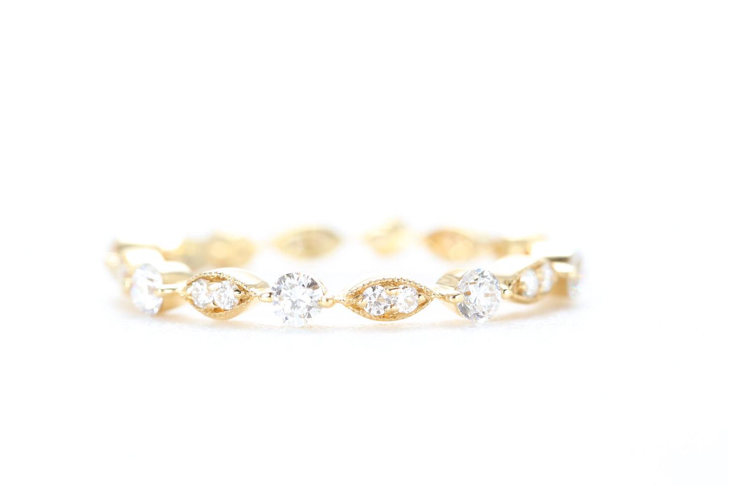 Round and Marquise Shaped Diamond Ring Yellow Gold
