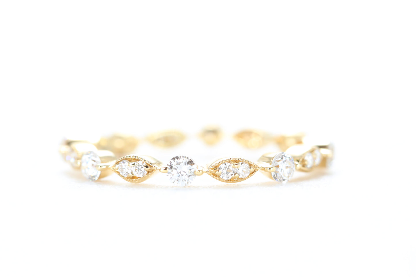 Round and Marquise Shaped Diamond Ring Yellow Gold