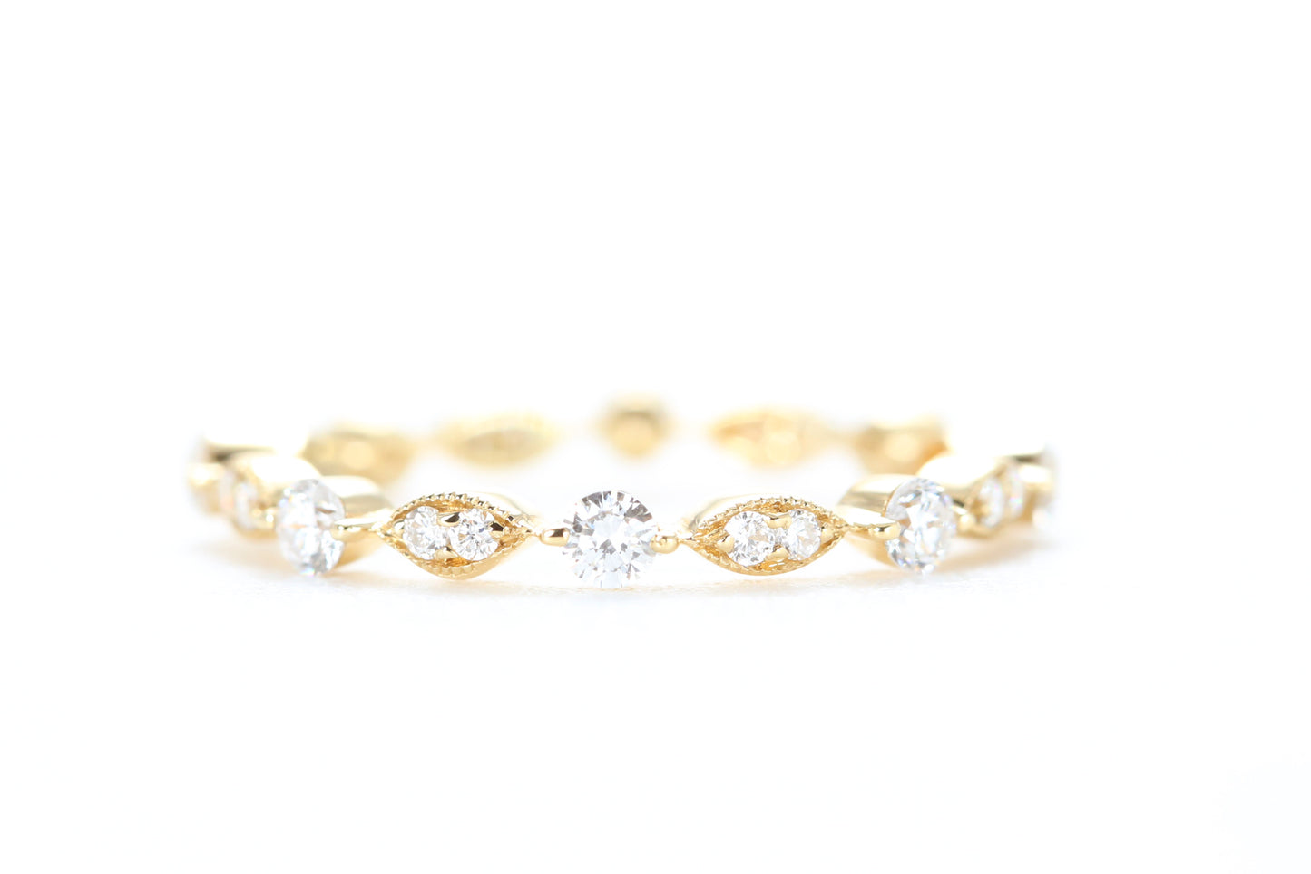 Round and Marquise Shaped Diamond Ring Yellow Gold