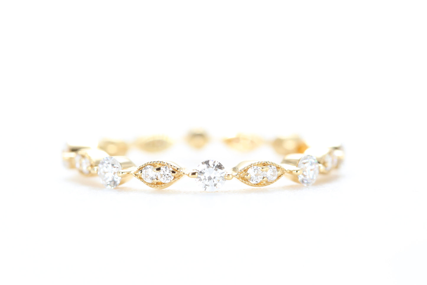 Round and Marquise Shaped Diamond Ring Yellow Gold