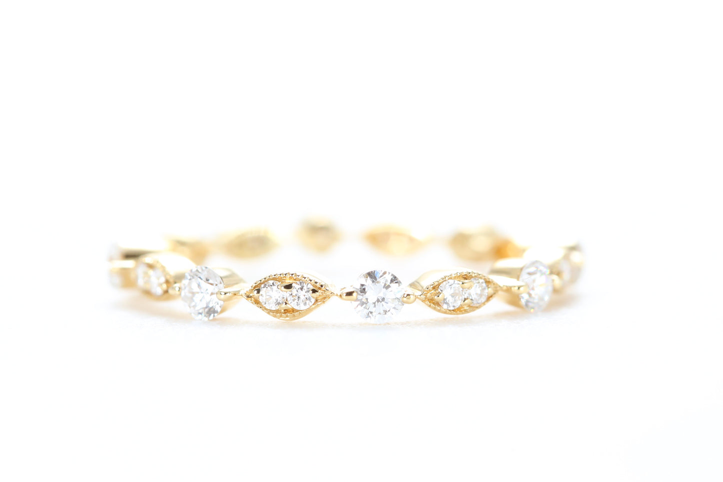 Round and Marquise Shaped Diamond Ring Yellow Gold