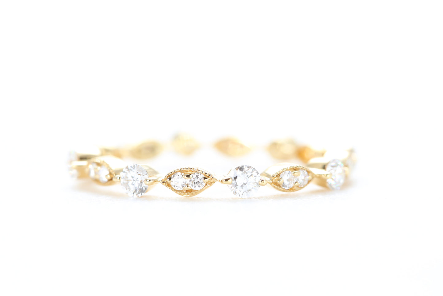 Round and Marquise Shaped Diamond Ring Yellow Gold