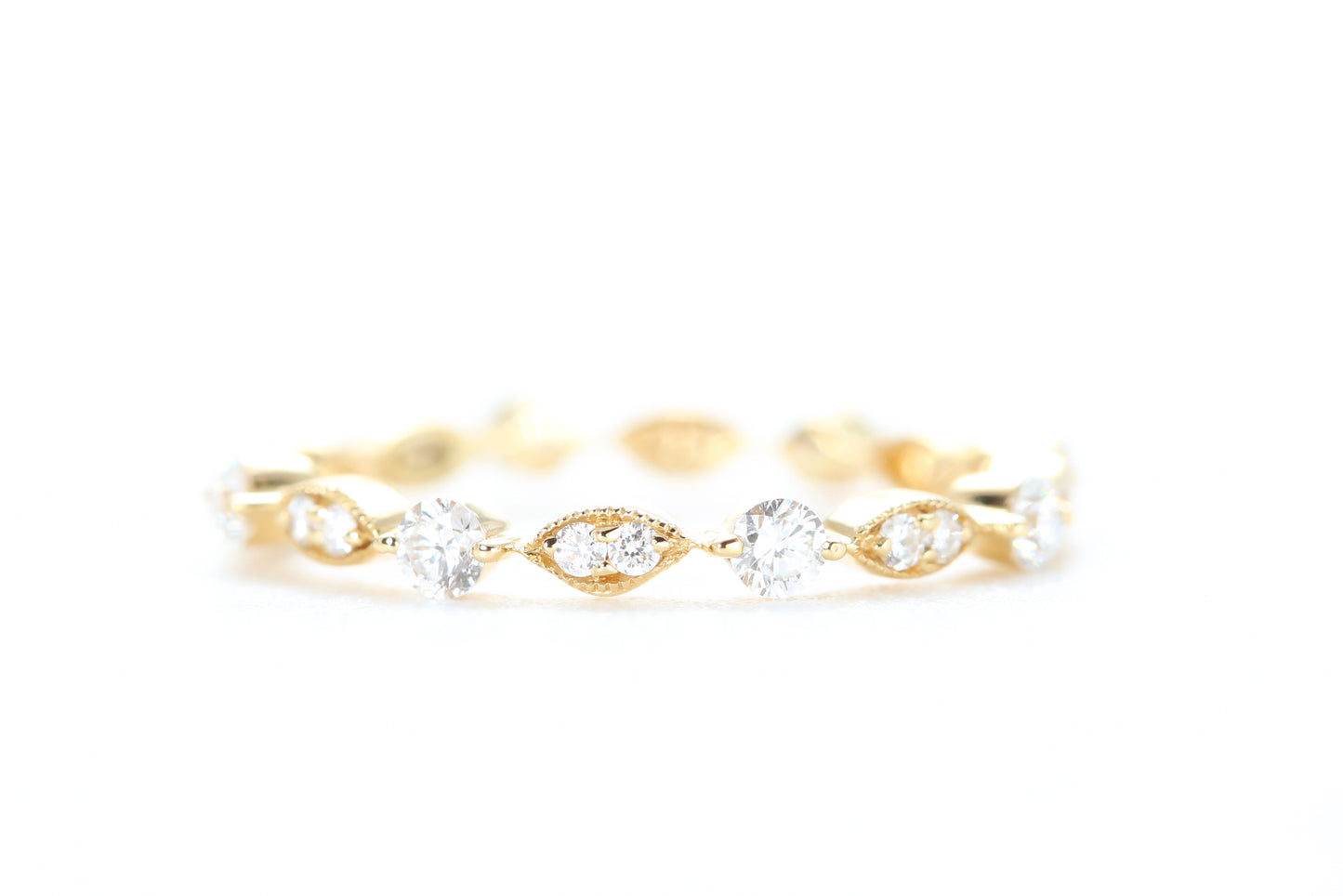 Round and Marquise Shaped Diamond Ring Yellow Gold
