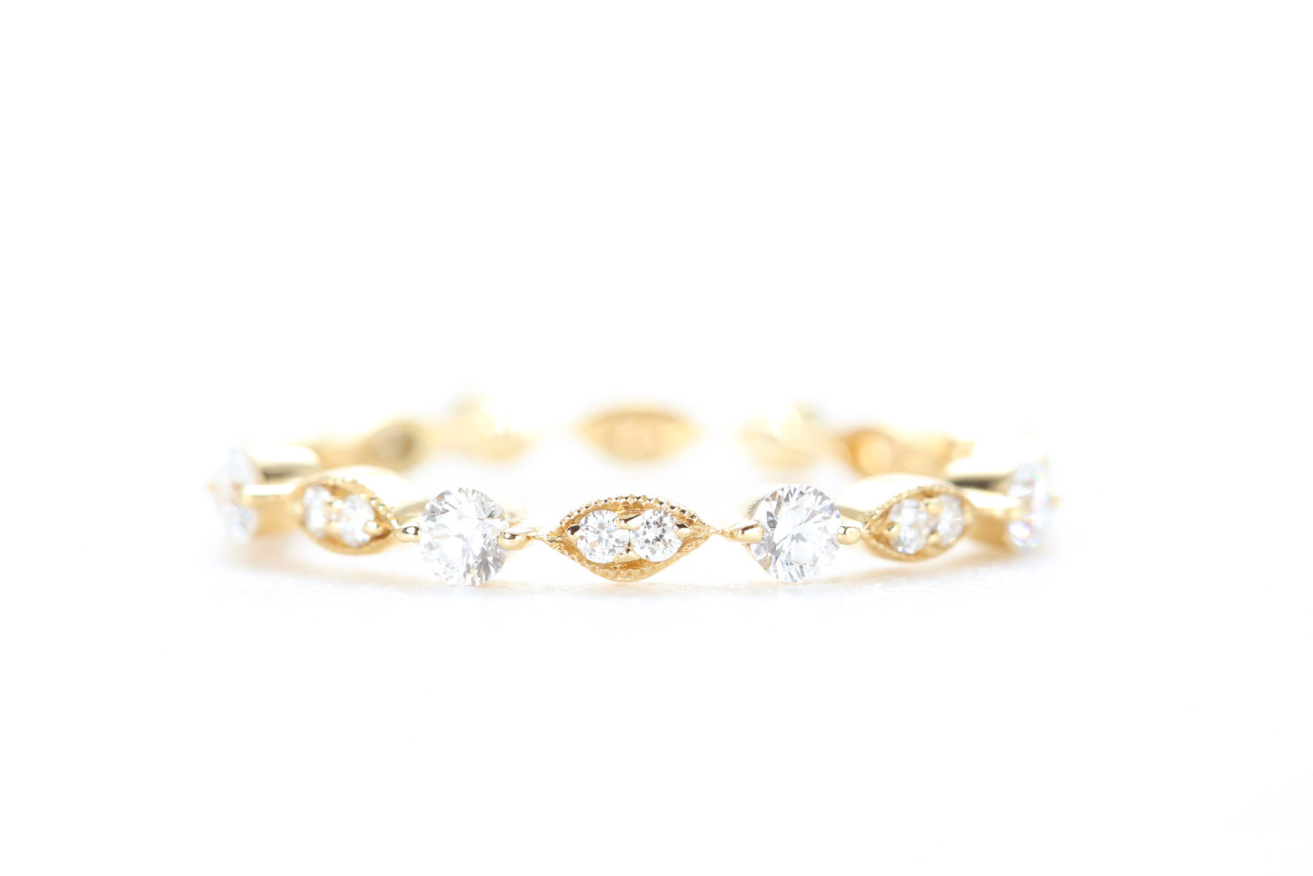 Round and Marquise Shaped Diamond Ring Yellow Gold