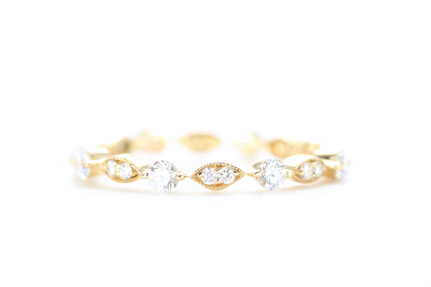 Round and Marquise Shaped Diamond Ring Yellow Gold