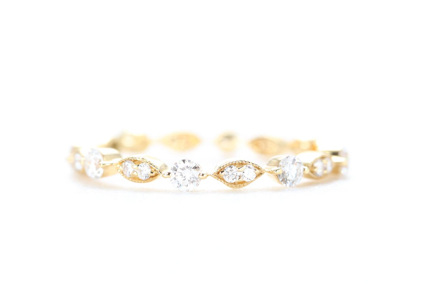Round and Marquise Shaped Diamond Ring Yellow Gold