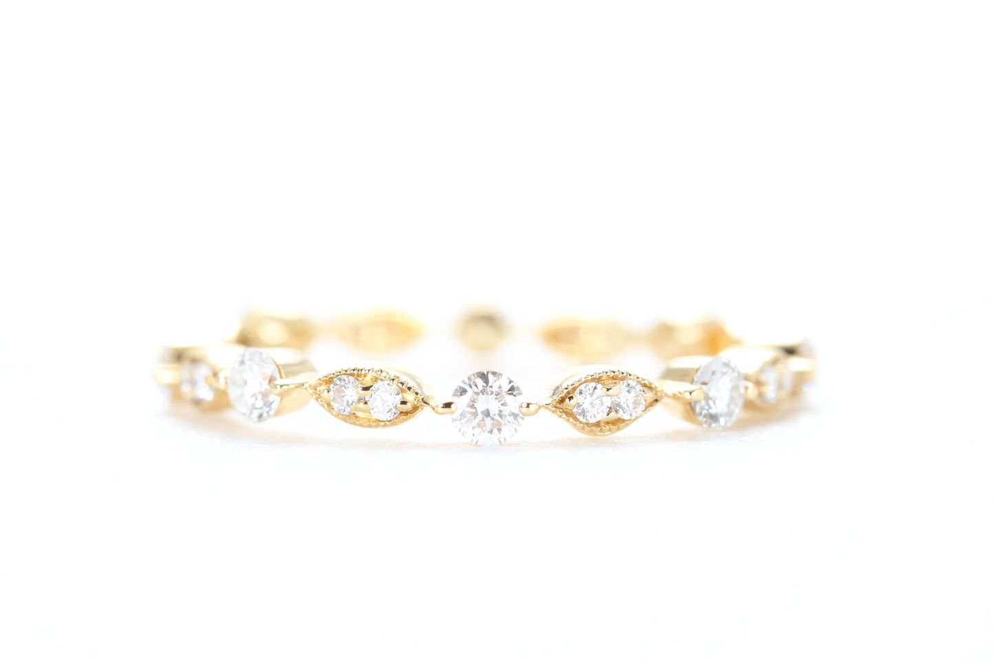Round and Marquise Shaped Diamond Ring Yellow Gold