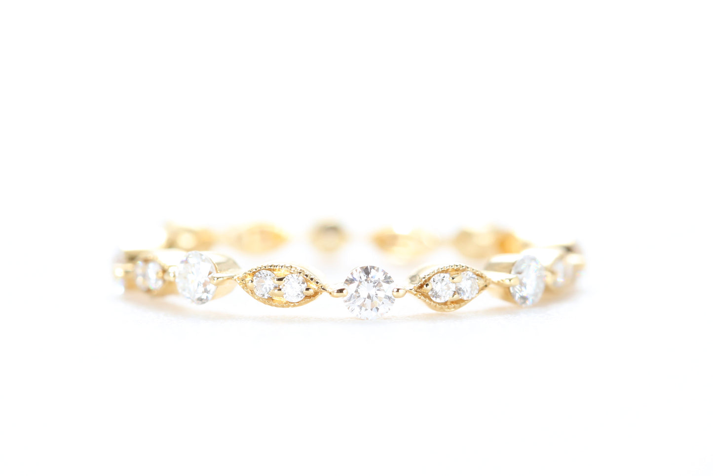 Round and Marquise Shaped Diamond Ring Yellow Gold