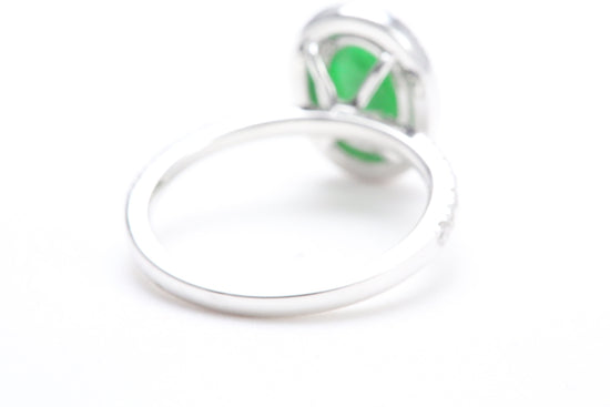 Oval Jadeite and Diamond Halo Ring