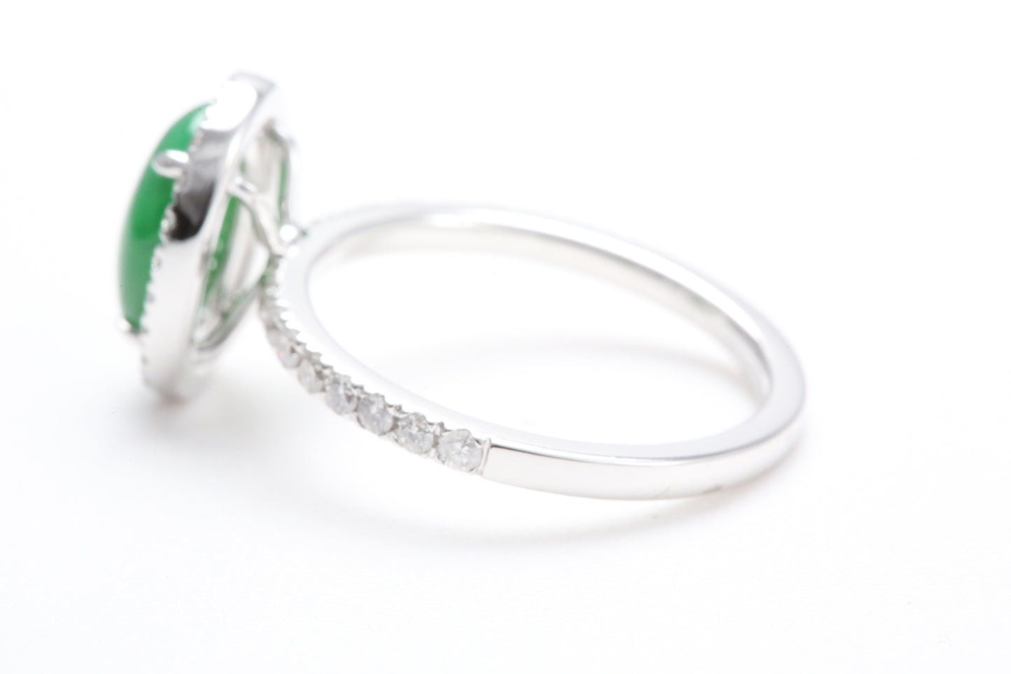 Oval Jadeite and Diamond Halo Ring