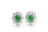 A pair of evenly matched imperial green jadeite cabochon and diamond earrings set in 18k white gold.  Framing the center stones are alternating sixteen pear brilliants and sixteen round brilliant cut diamonds for a total carat weight of 1.25 carats.  Earring measures 12mm tall by 10.5mm wide and 7.5mm at the thickest point.