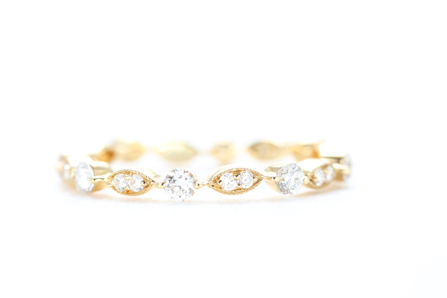 Round and Marquise Shaped Diamond Ring Yellow Gold
