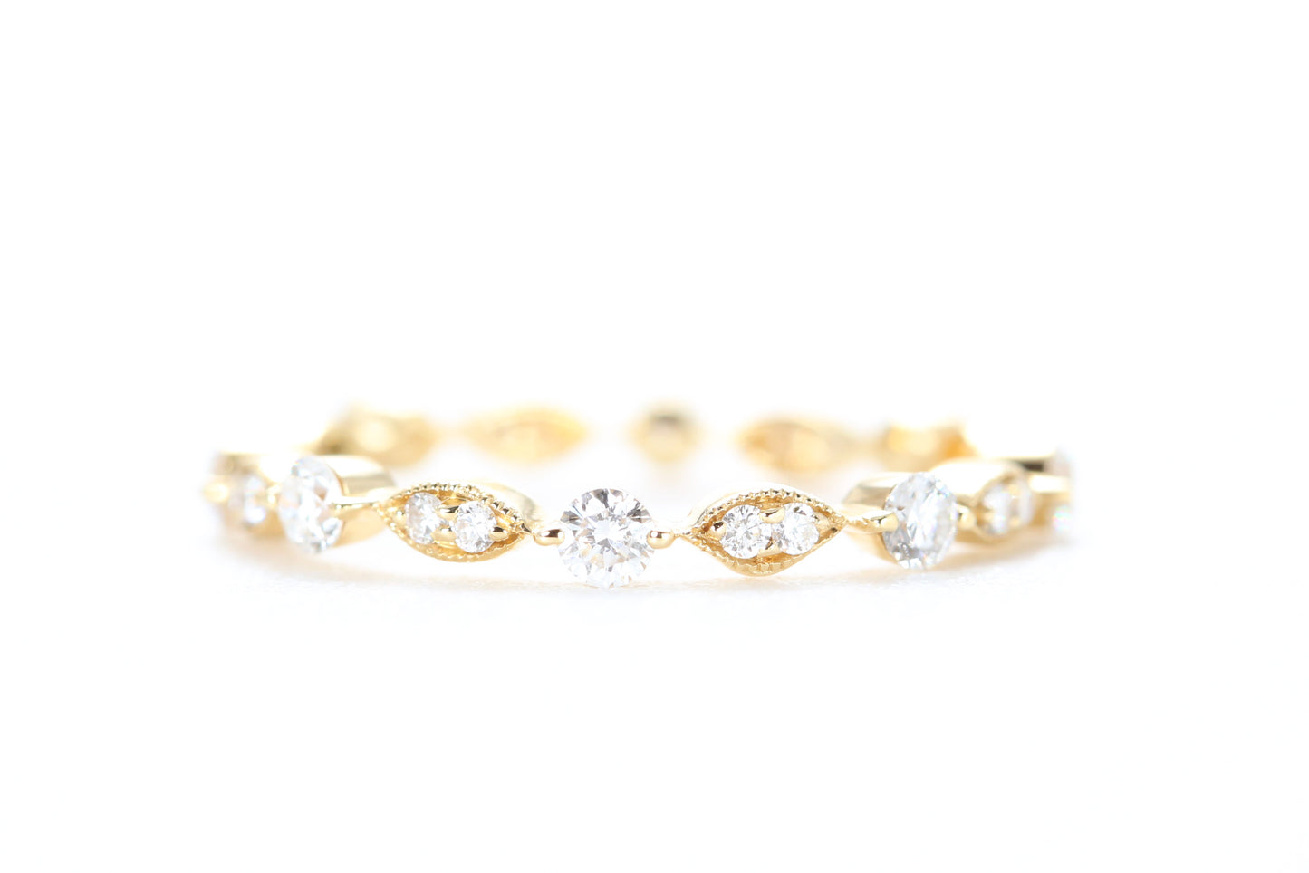 Round and Marquise Shaped Diamond Ring Yellow Gold